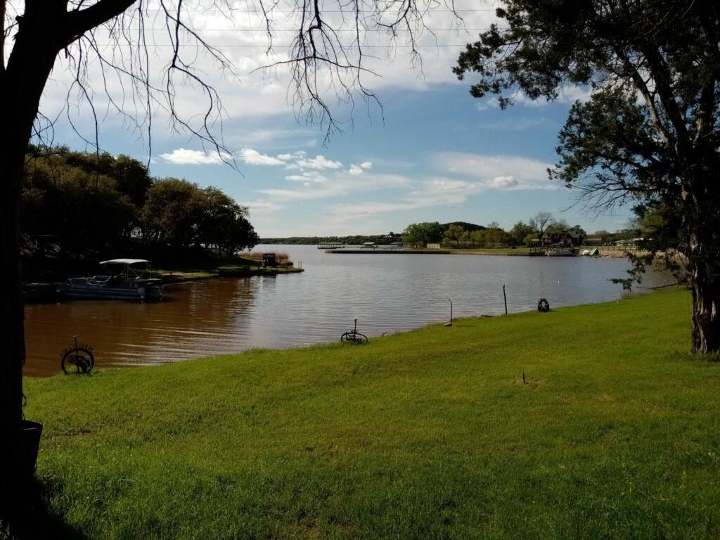 2334 San Bar Road, Unit 13 Graford, TX 76449 - Photo 31 of 33 a lake view with a house