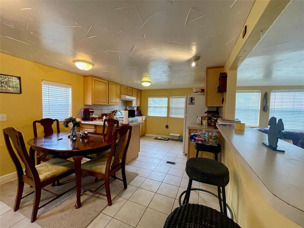 2334 San Bar Road, Unit 13 Graford, TX 76449 - Photo 6 of 33 a view of a dining room with furniture