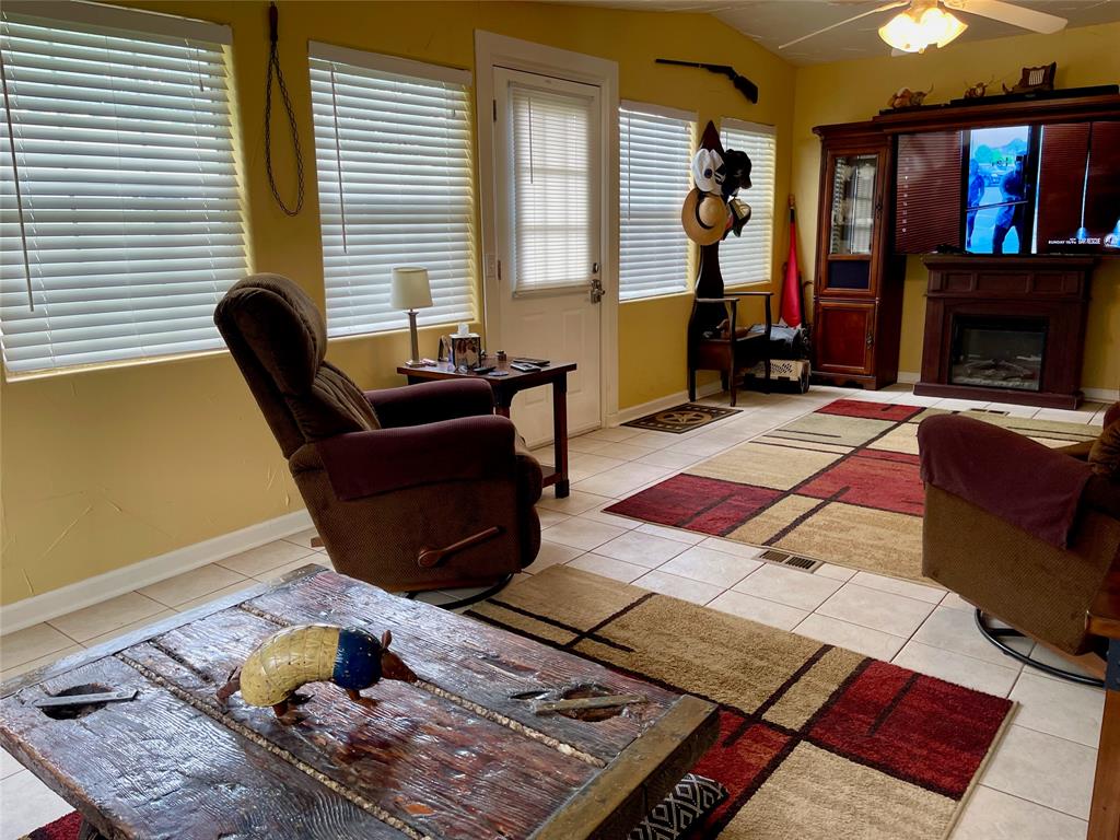 2334 San Bar Road, Unit 13 Graford, TX 76449 - Photo 7 of 33 a living room with furniture rug and window