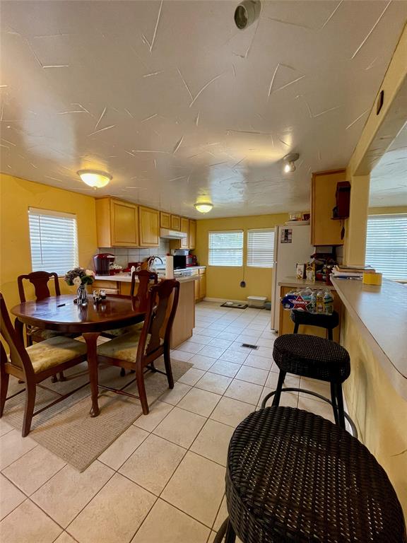 2334 San Bar Road, Unit 13 Graford, TX 76449 - Photo 8 of 33 a living room with furniture a rug and a piano