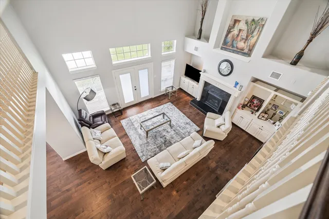 a living room with furniture and a rug