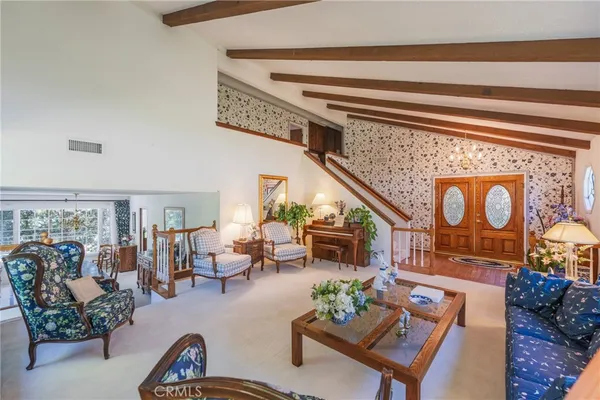 a front view of a house with wooden floor