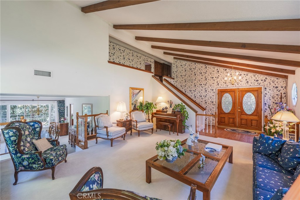 1920 Flint Rock Road Diamond Bar, CA 91765 - Photo 11 of 62 a living room with furniture and a potted plant