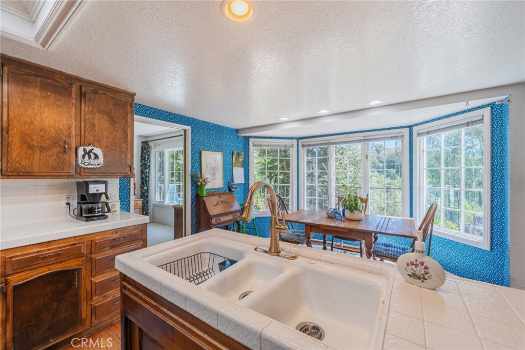 1920 Flint Rock Road Diamond Bar, CA 91765 - Photo 20 of 62 a bedroom with furniture and large windows