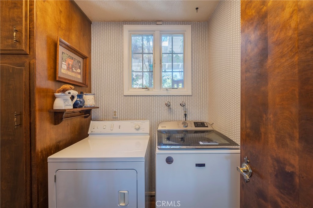 1920 Flint Rock Road Diamond Bar, CA 91765 - Photo 26 of 62 a utility room with dryer and washer
