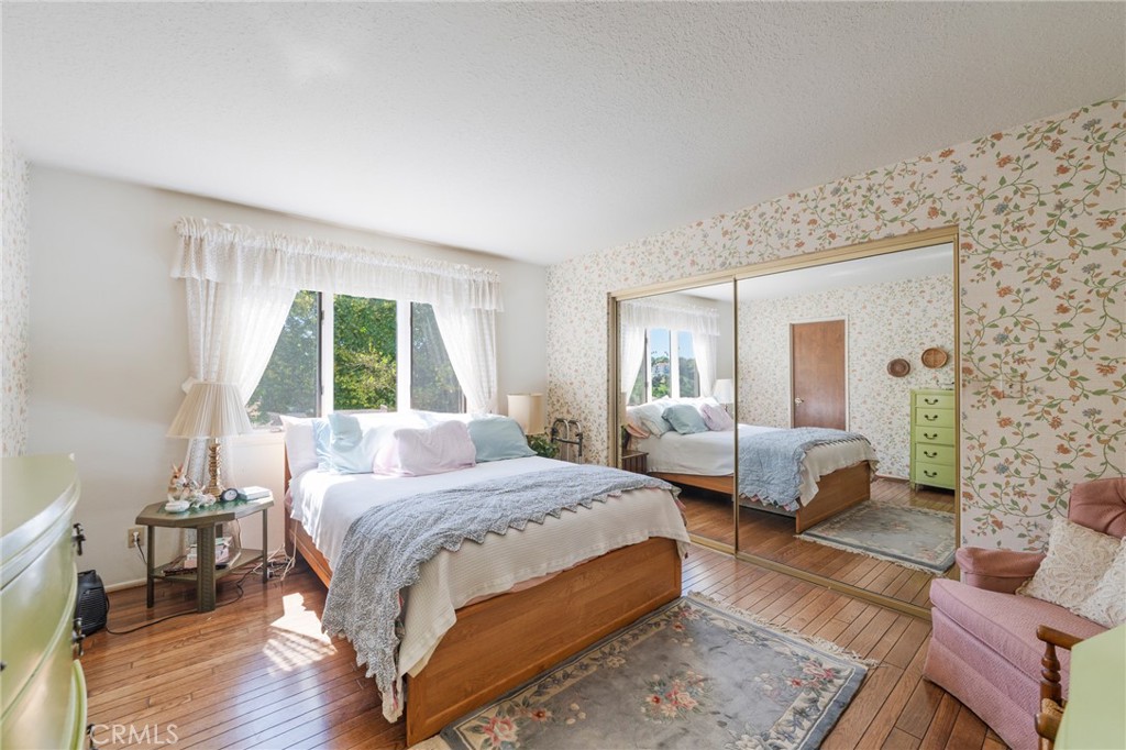 1920 Flint Rock Road Diamond Bar, CA 91765 - Photo 35 of 62 a bedroom with a bed and wooden floor