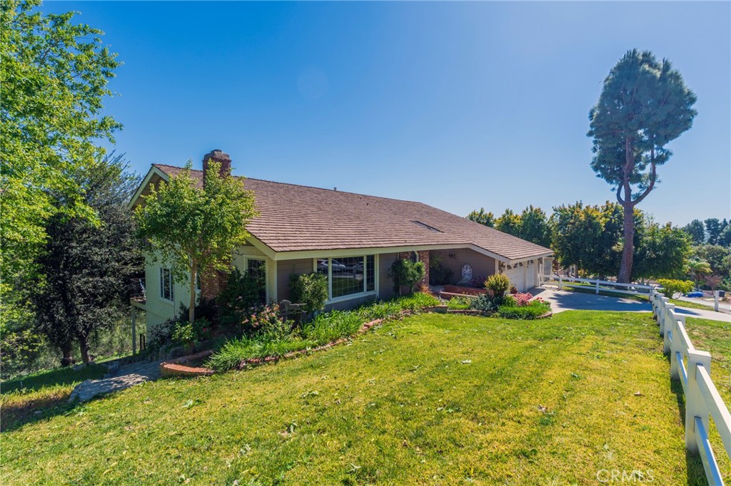 1920 Flint Rock Road Diamond Bar, CA 91765 - Photo 36 of 62 a front view of house with yard and green space