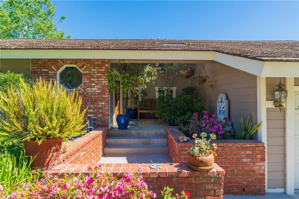 a front view of a house with a porch