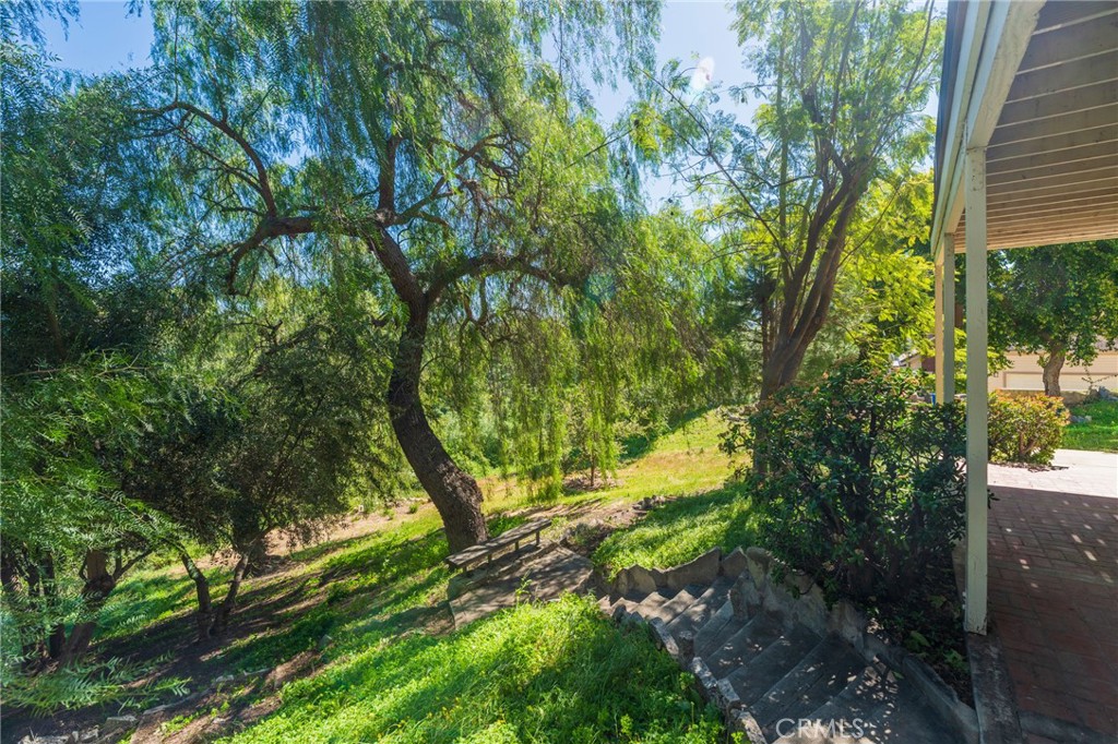 1920 Flint Rock Road Diamond Bar, CA 91765 - Photo 41 of 62 a backyard of a house with a yard and outdoor seating
