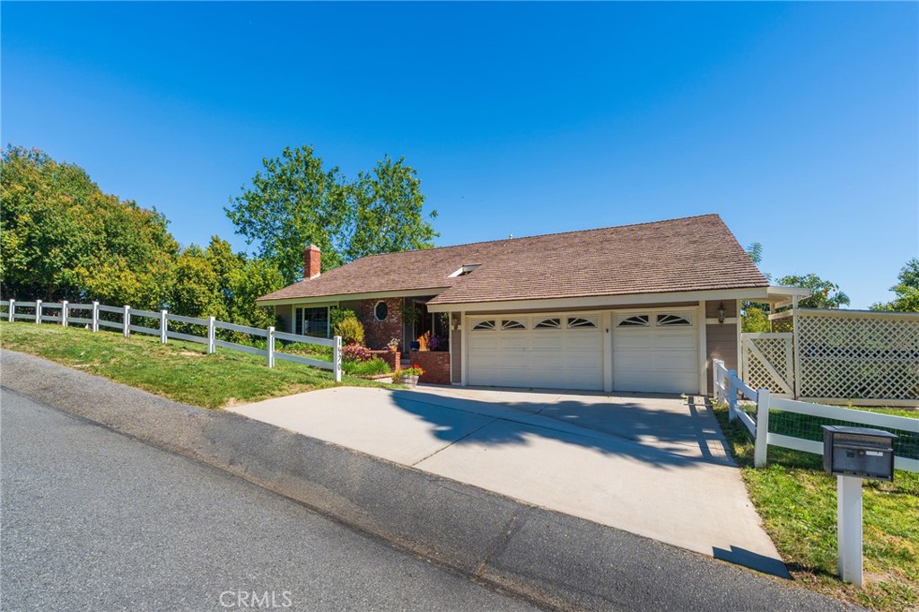 1920 Flint Rock Road Diamond Bar, CA 91765 - Photo 46 of 62 a front view of a house with yard