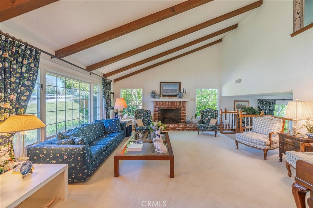 1920 Flint Rock Road Diamond Bar, CA 91765 - Photo 8 of 62 a living room with furniture fireplace and a large window