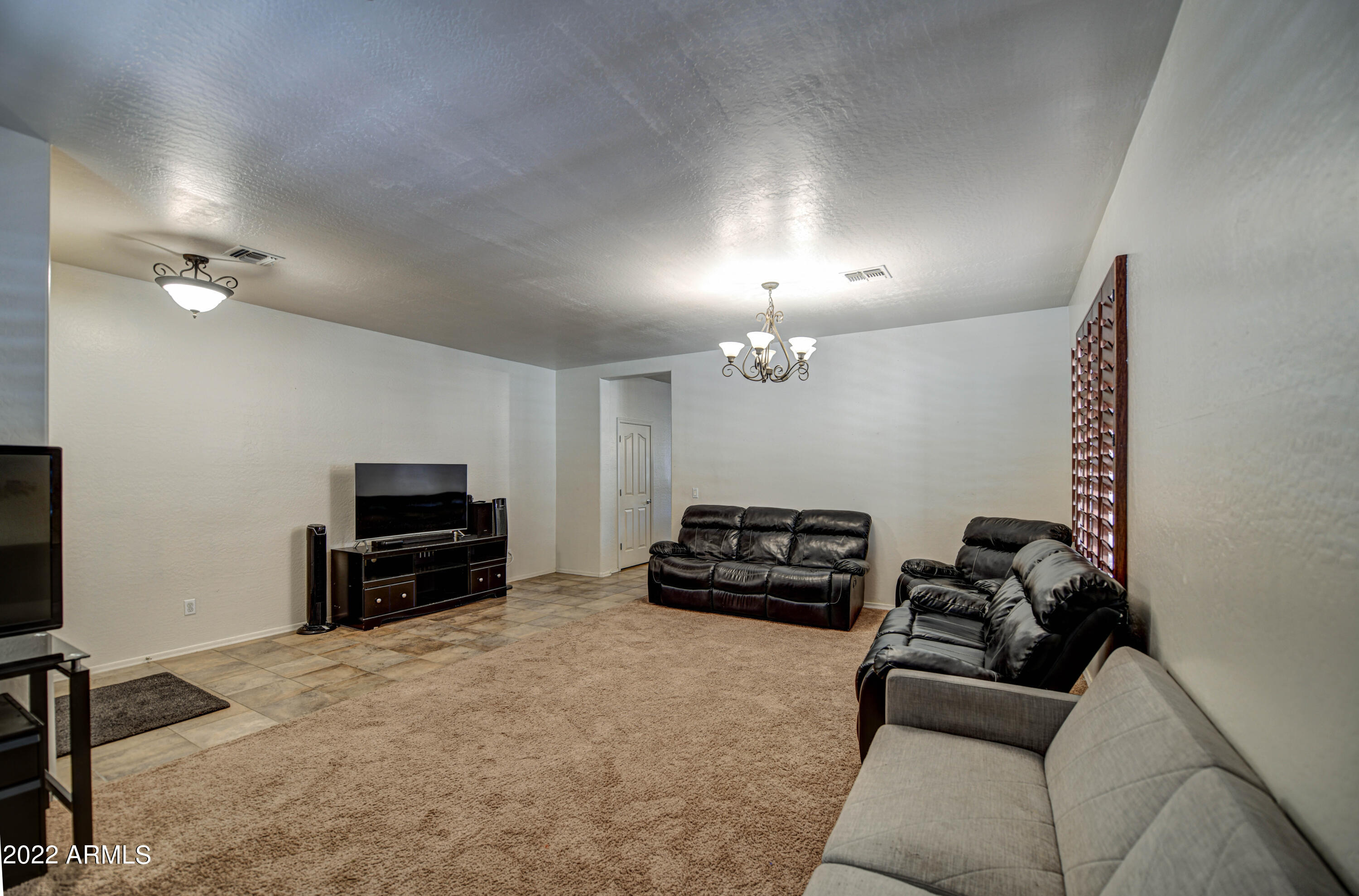 45242 Miramar Road Maricopa, AZ 85139 - Photo 7 of 45 Living Room 2
