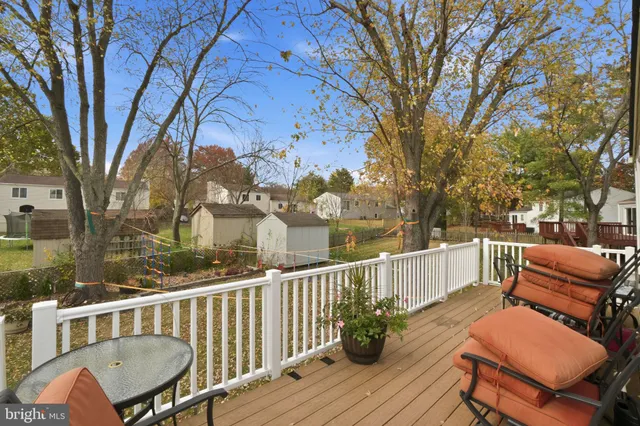 a view of a two chairs in the deck