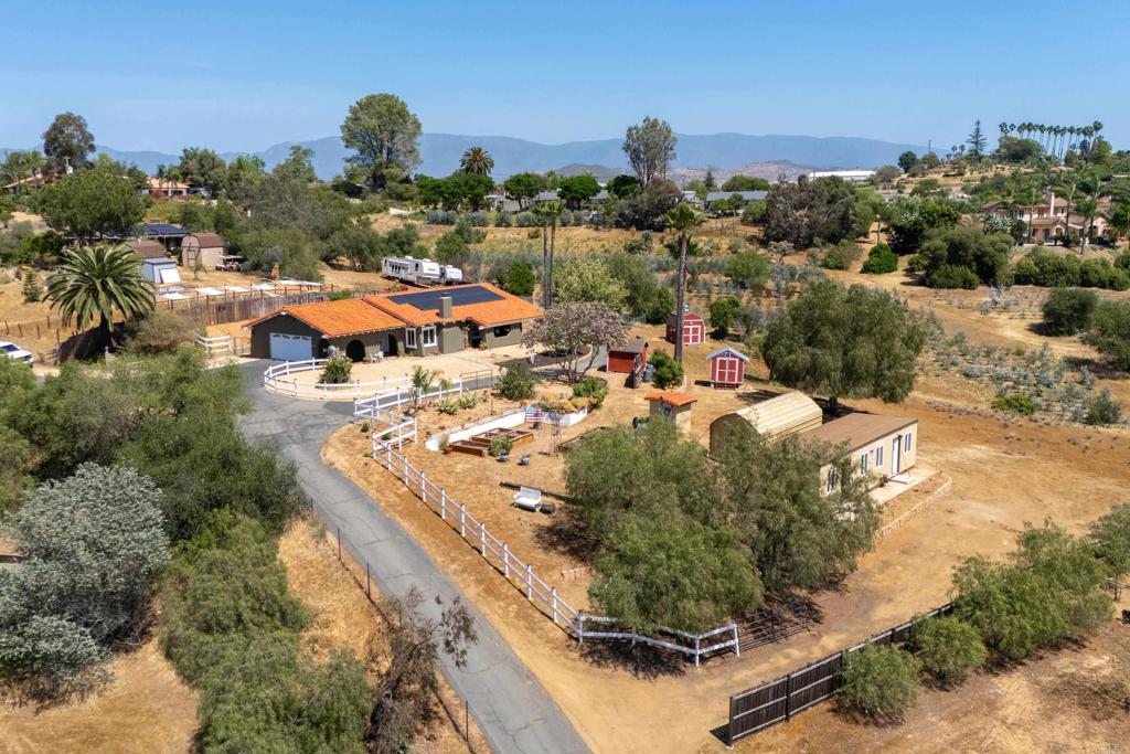 9908 West Lilac Road Escondido, CA 92026 - Photo 3 of 41 Entire lot landscaped: trees trimmed, mulch & rock added