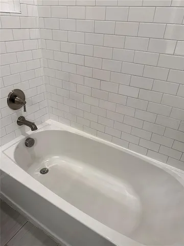 a bathroom with a bathtub