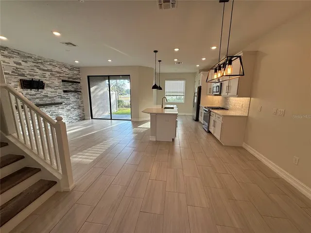 a view of kitchen with breakfast area