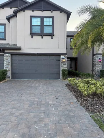 a view of a lake and palm trees