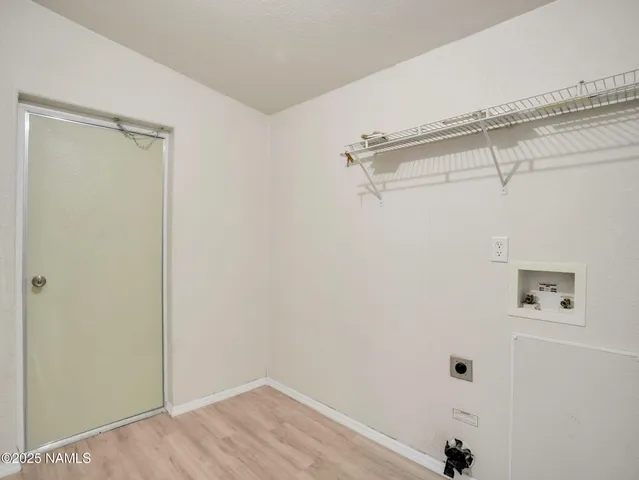 a view of a room with racks on the wall