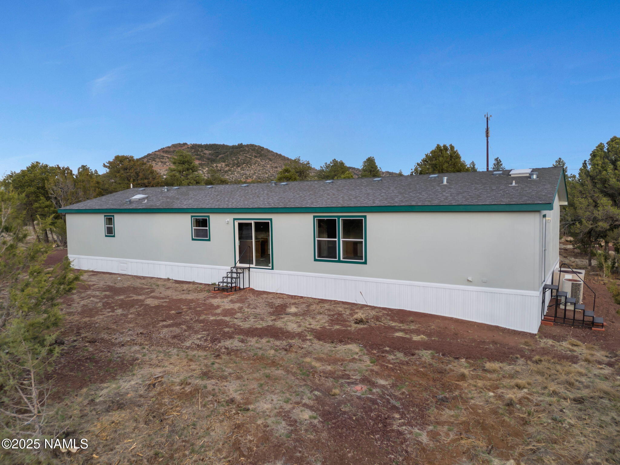 6512 North Santa Fe Road Williams, AZ 86046 - Photo 25 of 35 front view of house with an outdoor space