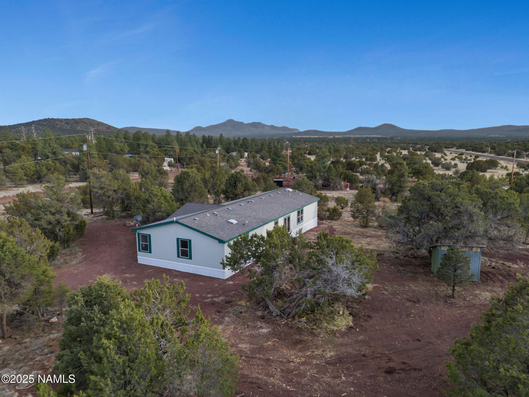 6512 North Santa Fe Road Williams, AZ 86046 - Photo 29 of 35 an aerial view of residential house with outdoor space