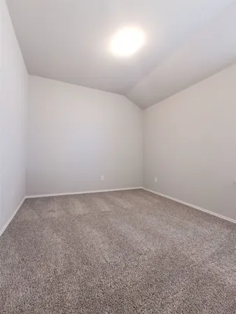 an empty room with a bench