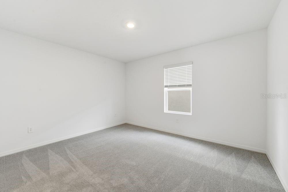 13231 Commons Avenue Parrish, FL 34219 - Photo 13 of 40 an empty room with a window