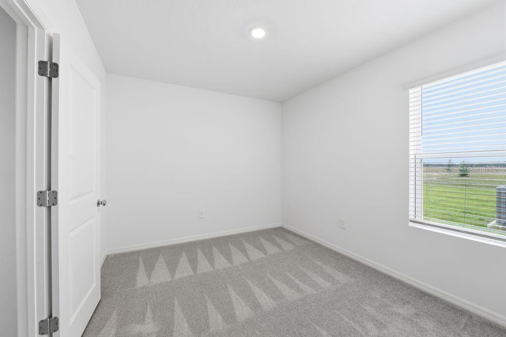 13231 Commons Avenue Parrish, FL 34219 - Photo 19 of 40 a view of a room that has a window in it