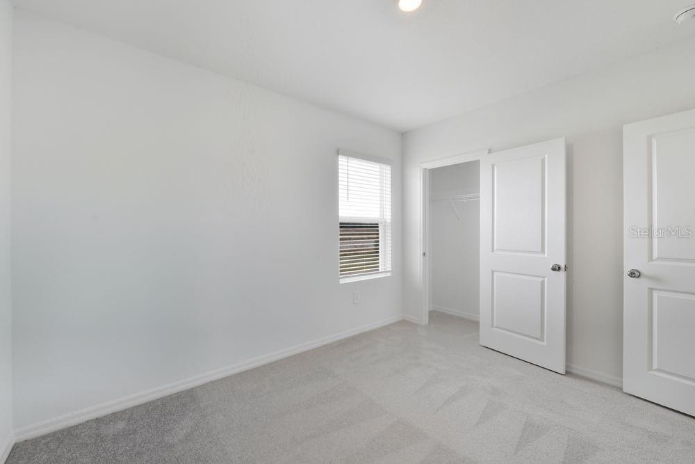 13231 Commons Avenue Parrish, FL 34219 - Photo 28 of 40 a view of an empty room with a window