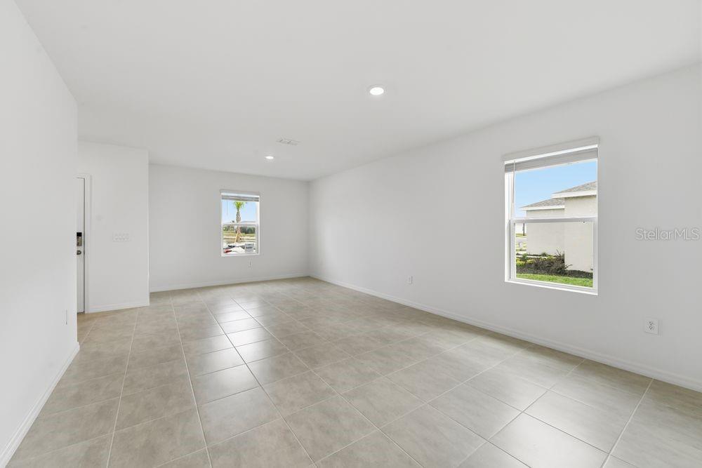 13231 Commons Avenue Parrish, FL 34219 - Photo 4 of 40 an empty room with windows