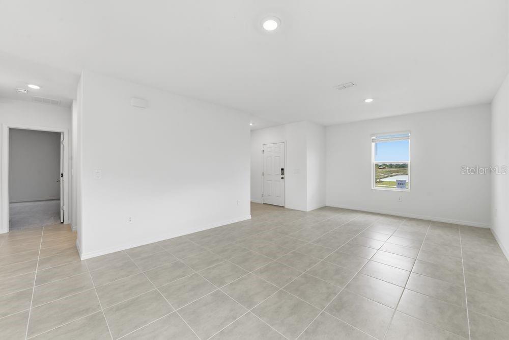 13231 Commons Avenue Parrish, FL 34219 - Photo 5 of 40 a view of an empty room with a window