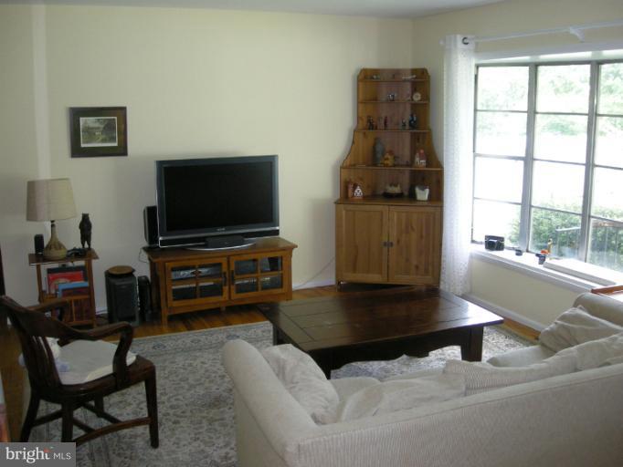 1824 Hanson Road Edgewood, MD 21040 - Photo 2 of 18 a living room with furniture and a flat screen tv