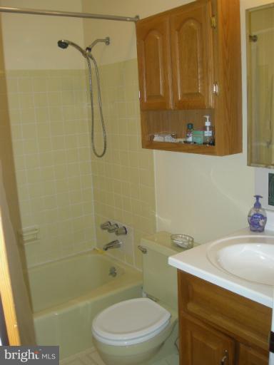 1824 Hanson Road Edgewood, MD 21040 - Photo 13 of 18 a bathroom with a sink a toilet and shower