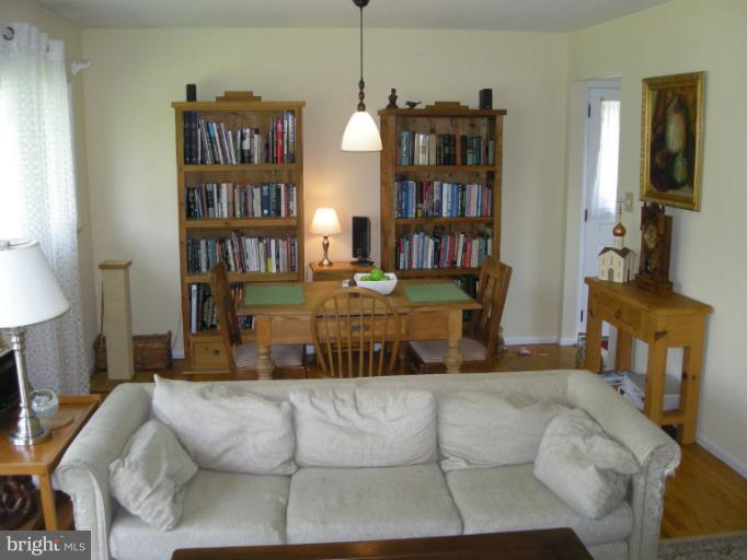 1824 Hanson Road Edgewood, MD 21040 - Photo 16 of 18 a living room with furniture and a book shelf