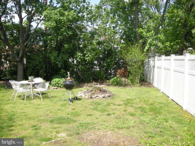 1824 Hanson Road Edgewood, MD 21040 - Photo 4 of 18 a view of a backyard with table and chairs