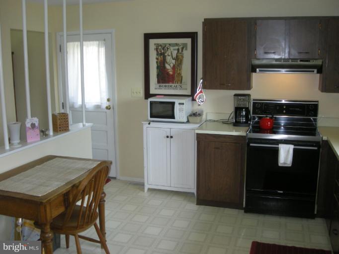 1824 Hanson Road Edgewood, MD 21040 - Photo 6 of 18 a kitchen with a stove a refrigerator and a stove