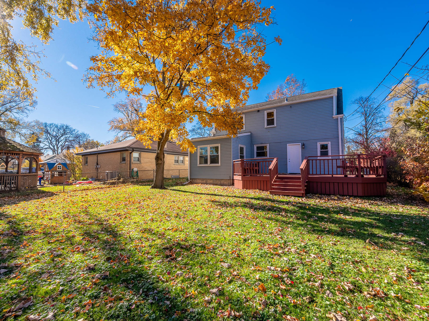 805 Spring Road Elmhurst, IL 60126 - Photo 16 of 16 a view of a house with a yard