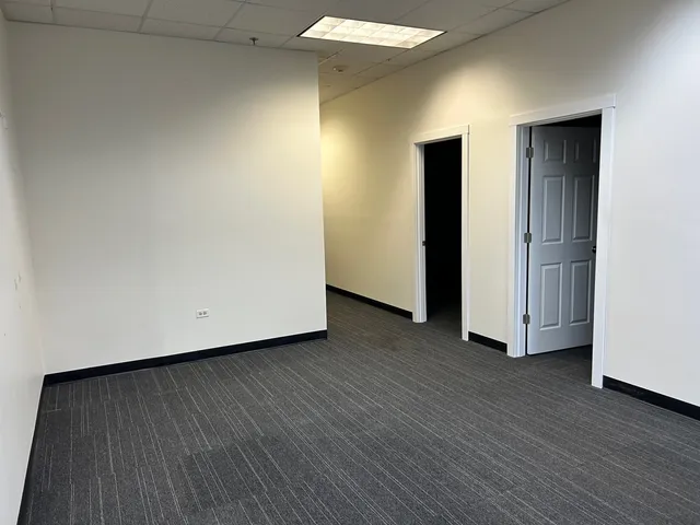 a view of a livingroom with wooden floor