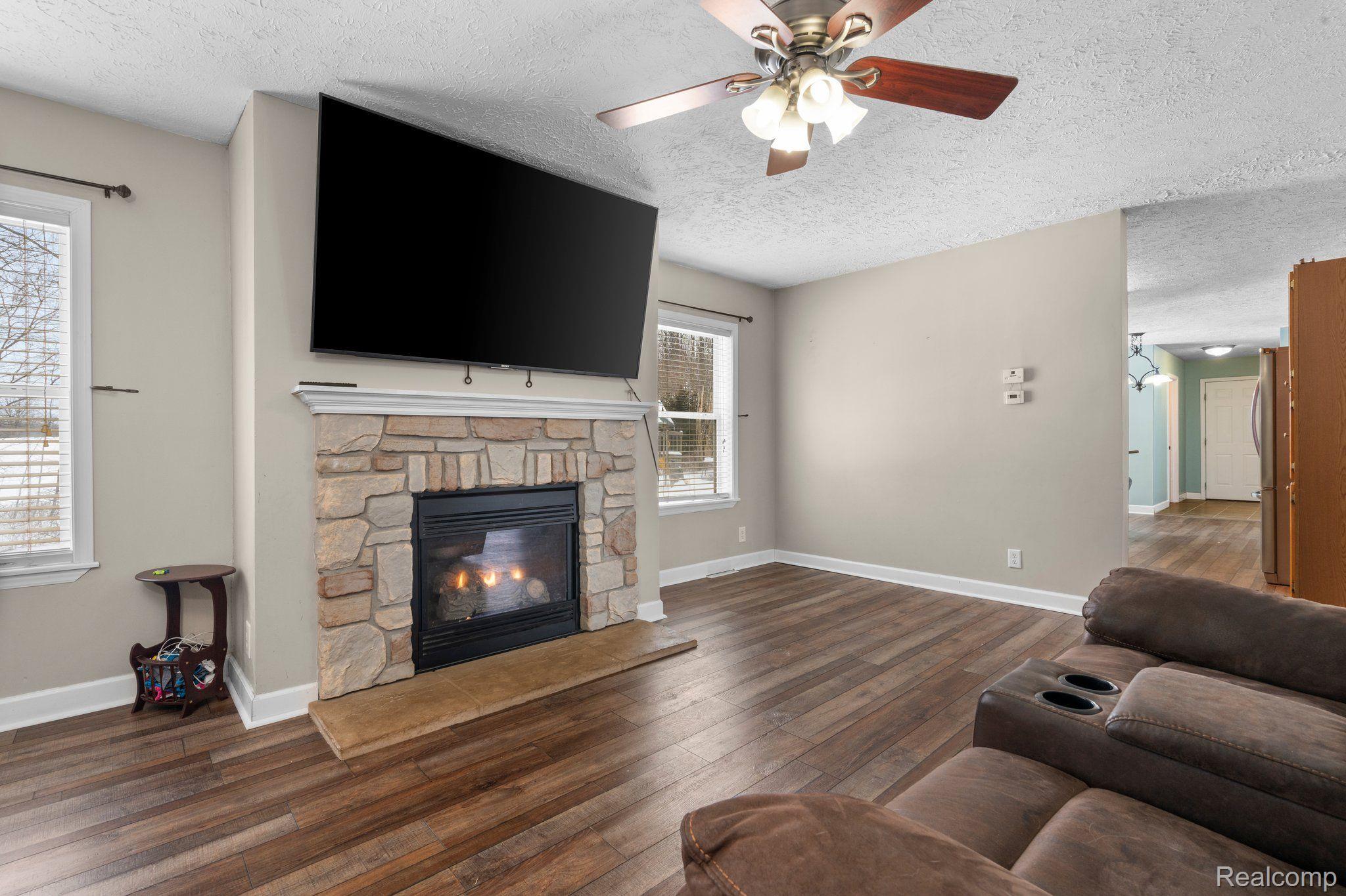 11699 West Iosco Road Webberville, MI 48892 - Photo 6 of 42 Sitting room/Dining room open to eat in kitchen
