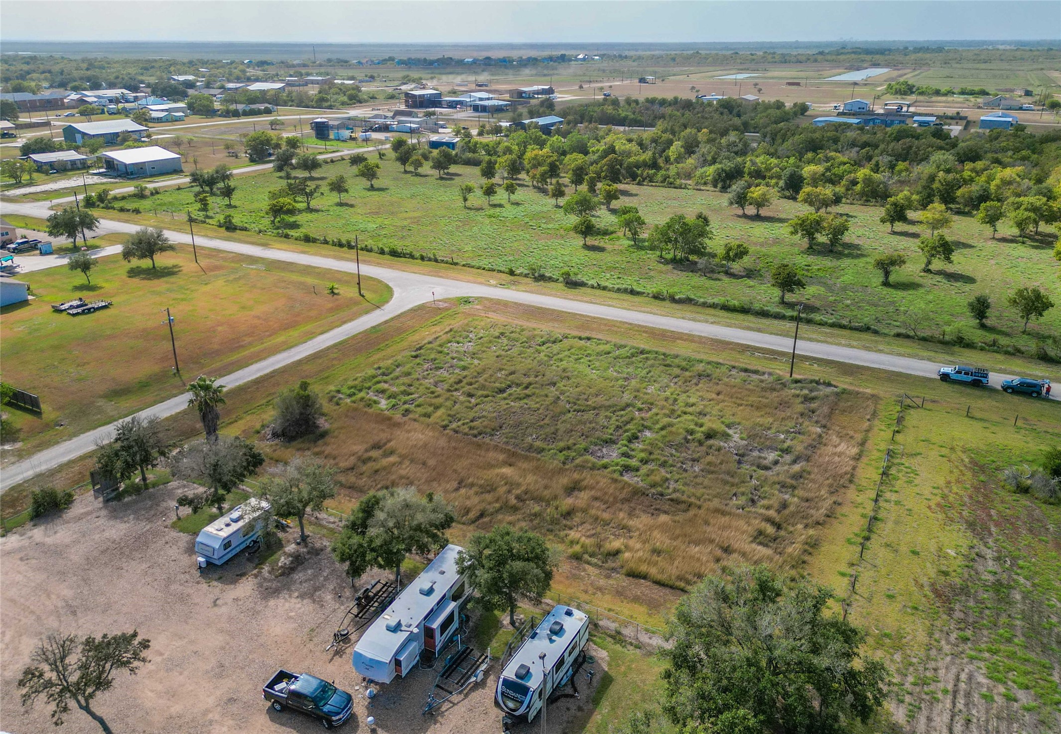 Lot 6 Austin Matagorda, TX 77457 - Photo 6 of 15 an aerial view of a house with a yard