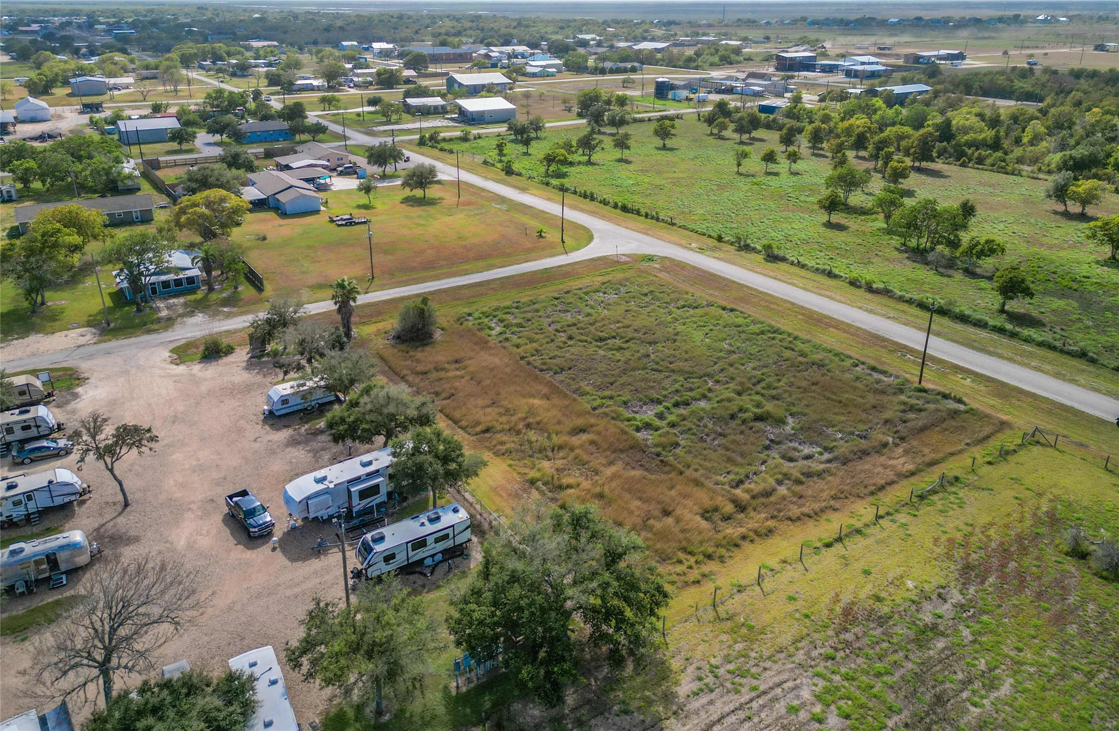 Lot 6 Austin Matagorda, TX 77457 - Photo 7 of 15 an aerial view of residential houses with outdoor space