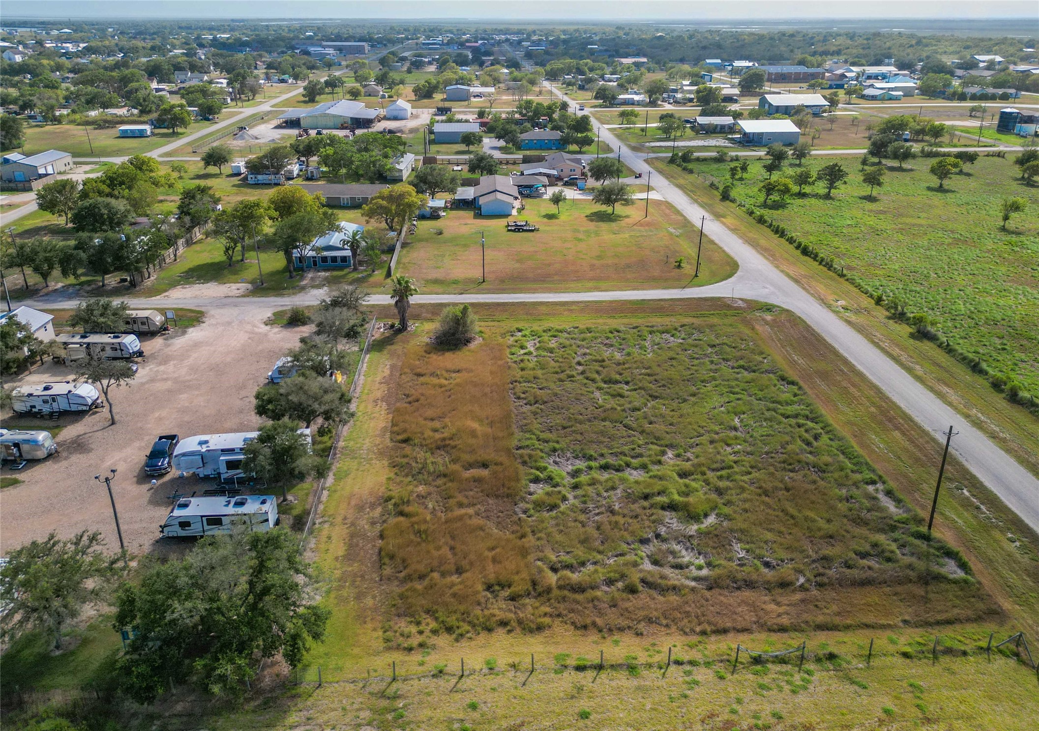 Lot 6 Austin Matagorda, TX 77457 - Photo 9 of 15 an aerial view of residential houses with outdoor space