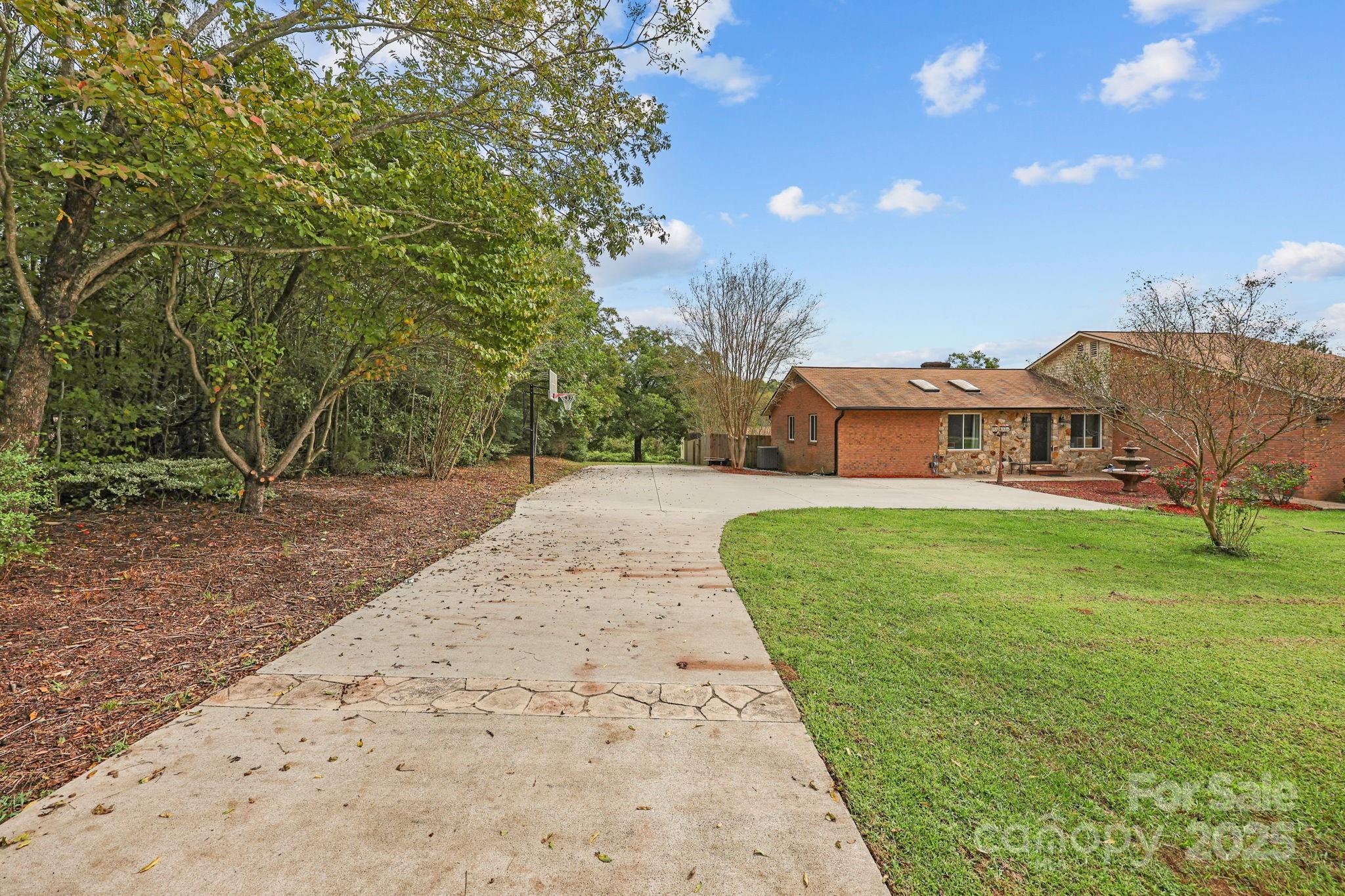 1765 Liberty Road Gold Hill, NC 28071 - Photo 13 of 41 a view of a house with a big yard