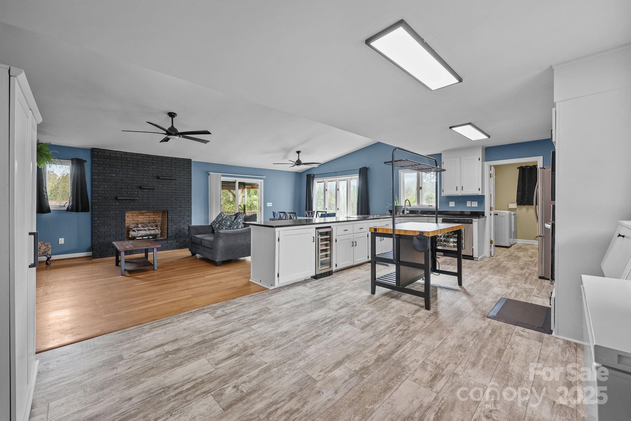 1765 Liberty Road Gold Hill, NC 28071 - Photo 3 of 41 a living room with furniture and kitchen view
