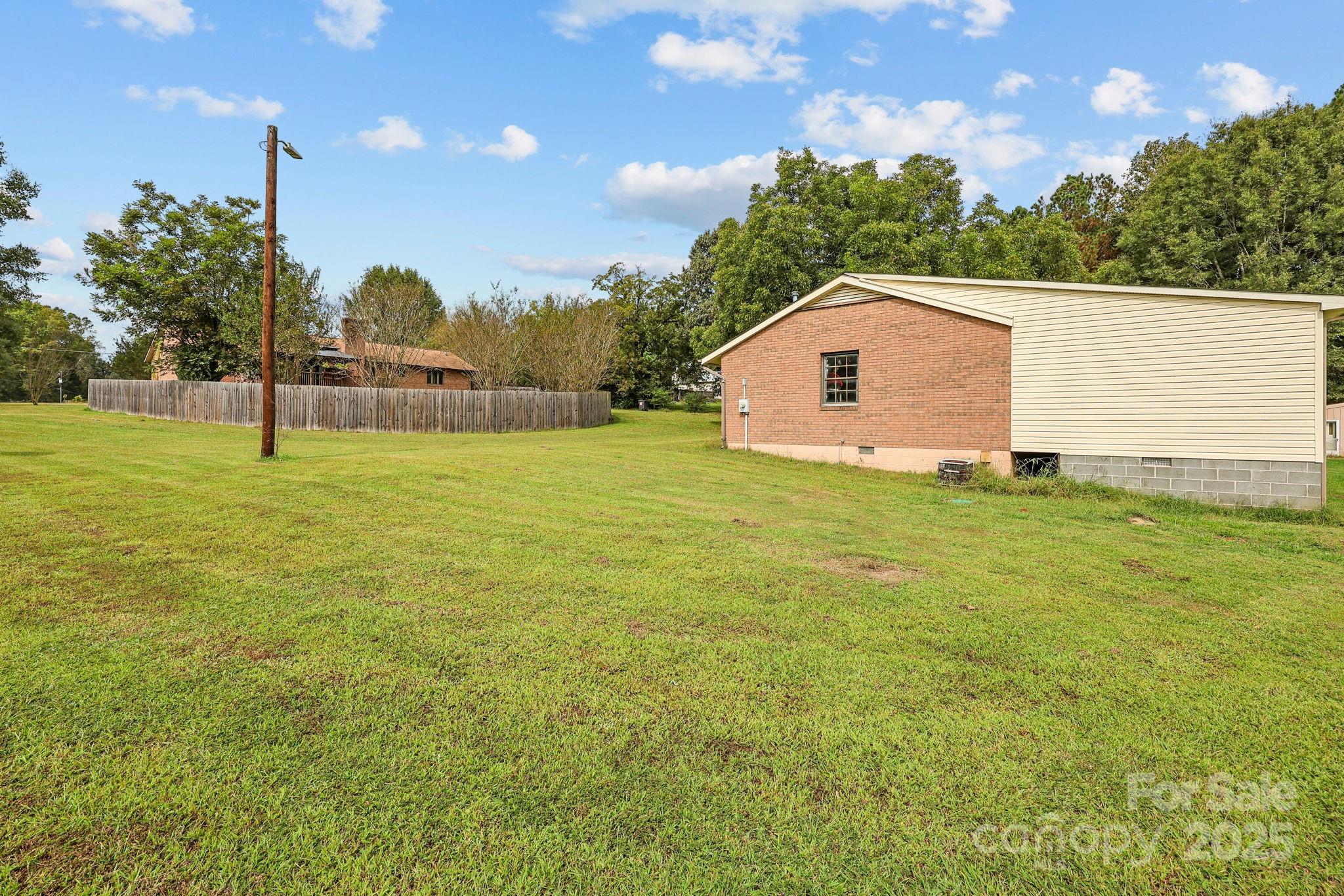 1765 Liberty Road Gold Hill, NC 28071 - Photo 35 of 41 a house view with garden space