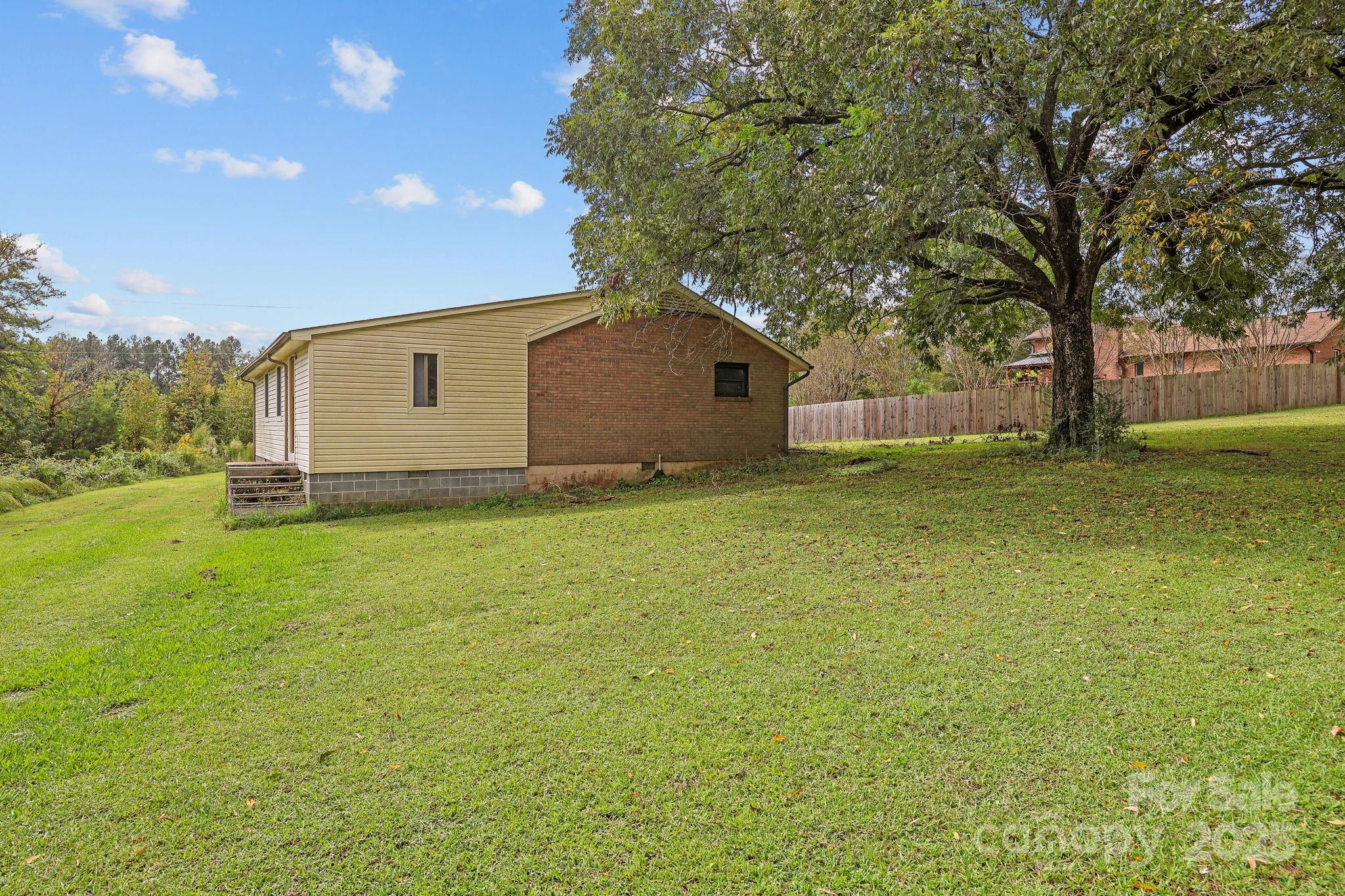 1765 Liberty Road Gold Hill, NC 28071 - Photo 39 of 41 a front view of house with yard and trees