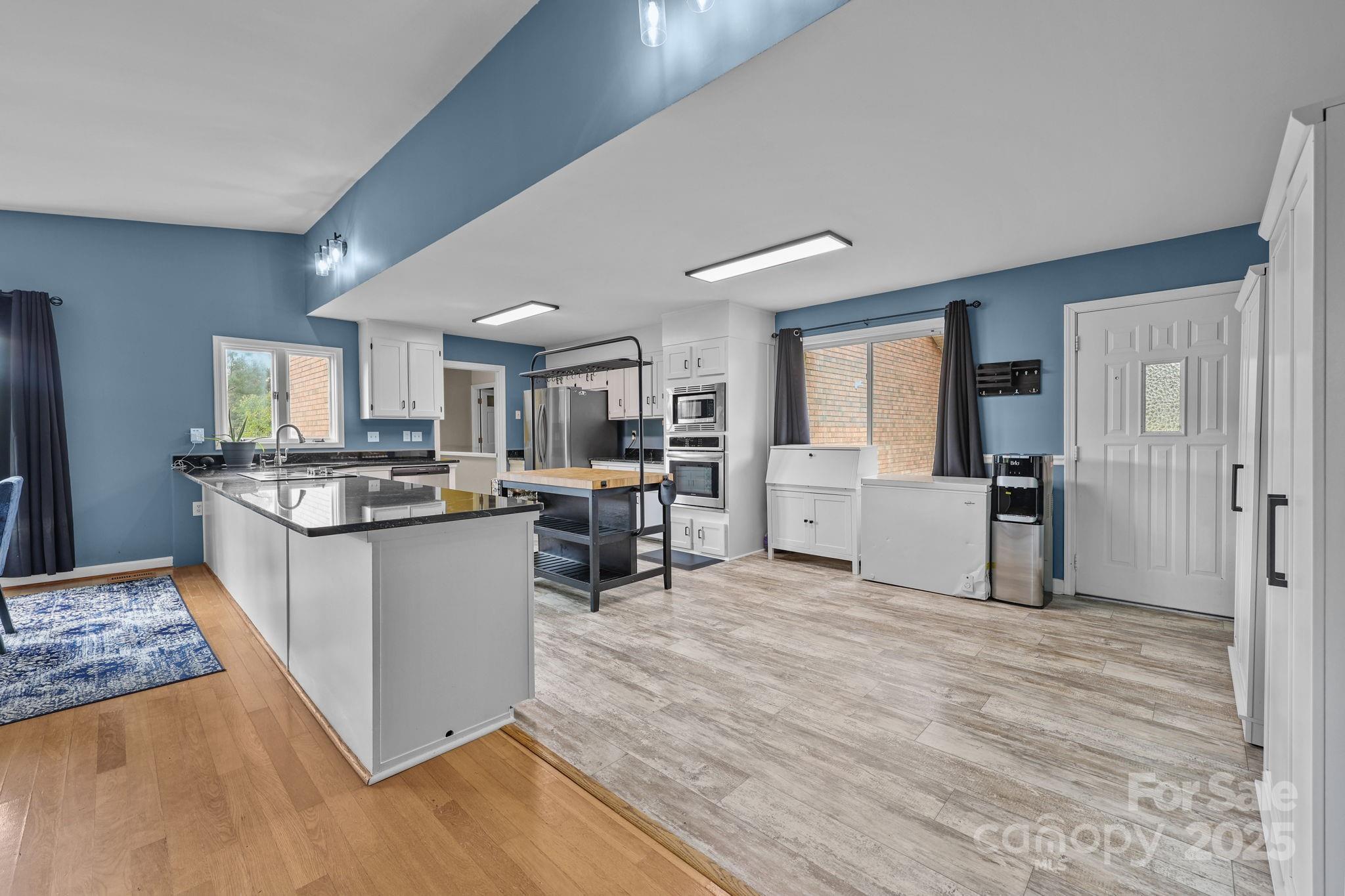 1765 Liberty Road Gold Hill, NC 28071 - Photo 4 of 41 a kitchen with a refrigerator and a sink