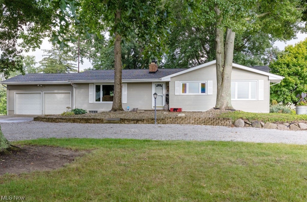 7838 Peck Road Ravenna, OH 44266 - Photo 35 of 35 Single story home with a front yard and garage