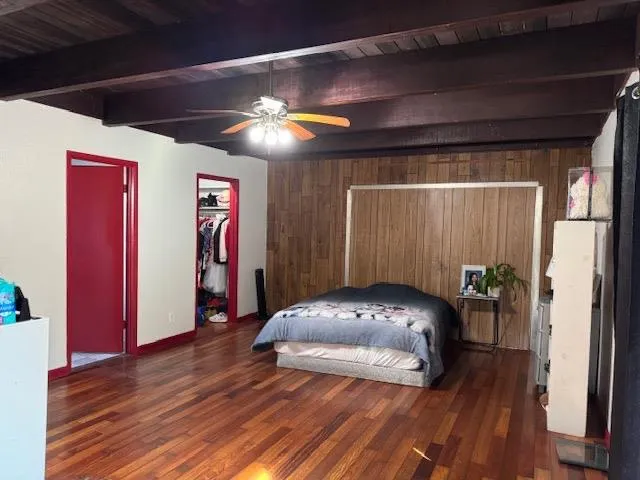 a view of a livingroom with furniture and staircase