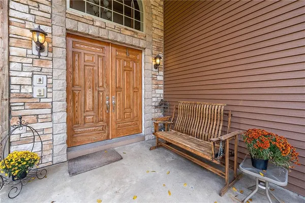 a view of a porch with a bench