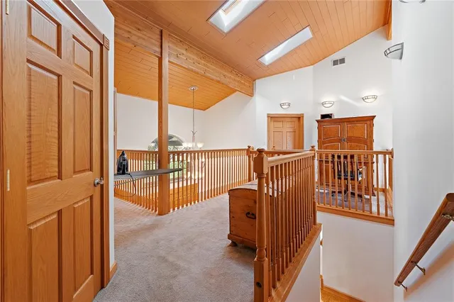 a view of balcony with furniture